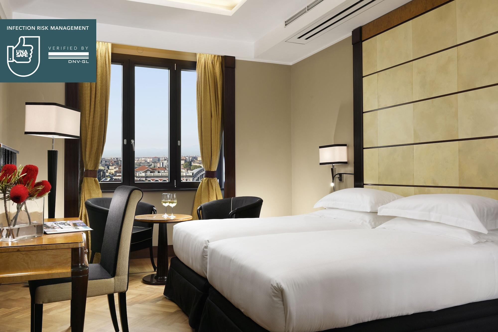 فندق برينسيبي دي بيمونتي - أونا إسبيرينزي تورينو المظهر الخارجي الصورة A room at the hotel