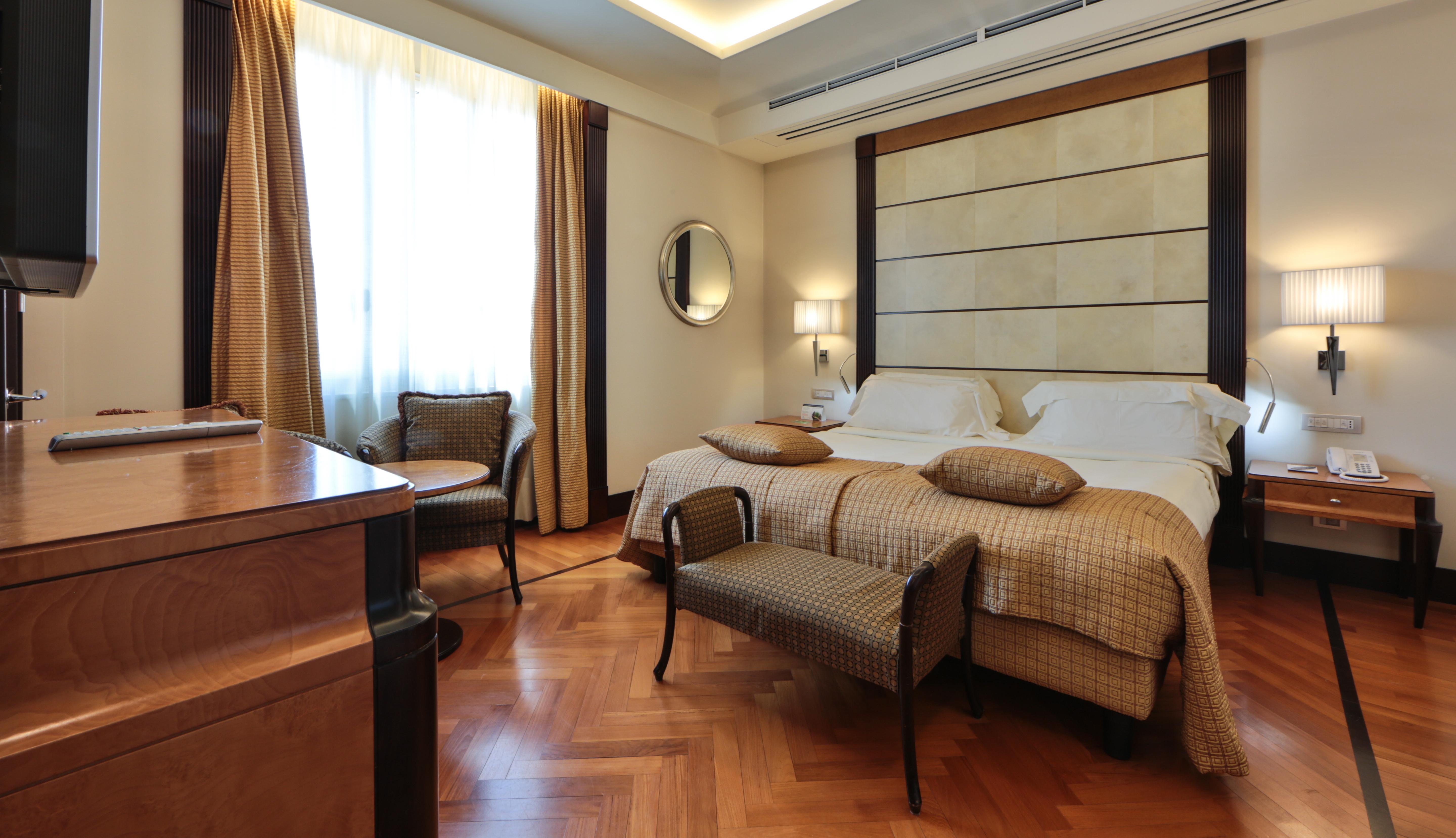 فندق برينسيبي دي بيمونتي - أونا إسبيرينزي تورينو المظهر الخارجي الصورة A room at the hotel